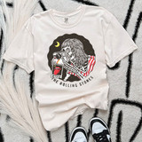 Stones Music DTF Heat Transfer, T-shirt featuring a graphic of a person taking a photo with a camera, surrounded by moon and stars, with the Rolling Stones logo and text 'No Filter' on a black and white illustration.