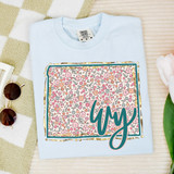 WY Spring Floral DTF Heat Transfer, colorful floral pattern design on a light blue T-shirt with the word 'Yay' on it.