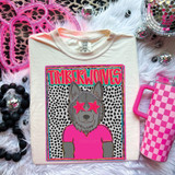 Timberwolves Colorful Mascot DTF Heat Transfer, vibrant design of a wolf mascot with star-shaped sunglasses and a pink shirt on a white t-shirt surrounded by pink and black accessories.