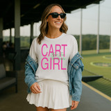 Cart Girl Here For The Drinks DTF Heat Transfer, a woman wearing sunglasses and a white sweatshirt with pink and green text, standing at a golf course.