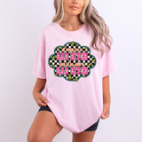 I May Be A Sad Bitch But I'm Still A Bad Bitch DTF Heat Transfer, a woman wearing a pink T-shirt with the humorous graphic text preview.