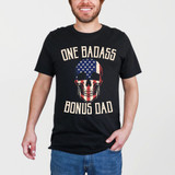 One Badass Bonus Dad Flag Skull DTF Heat Transfer, black T-shirt with skull featuring American flag design and bold text.