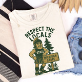 Respect Your Locals - PICK YOUR TEAM DTF Heat Transfer, illustration of a Spartan warrior holding a Michigan State sign, with trees in the background.