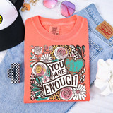 You Are Enough Boho Florals DTF Heat Transfer, colorful floral and leopard print design with inspiring message on coral-colored t-shirt.