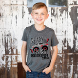Back To School Ready To Crush DTF Heat Transfer, a young boy wearing a grey t-shirt with a fun graphic design featuring a monster truck, stars, and lightning bolts.