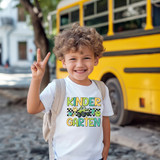 Back To School Monster Truck DTF Heat Transfer, a young boy smiling and making a peace sign while standing in front of a yellow school bus.