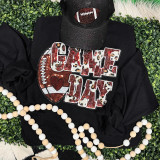 Maroon Football Leopard & Sequins Patch, close-up of a decorative patch featuring a football design with leopard print and sequins on a black fabric background.