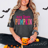 Colorful Hey There Pumpkin DTF Heat Transfer, vibrant multicolor pumpkin and text design on a dark t-shirt