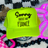 Sorry About My Fiance DTF Heat Transfer, bright neon green trucker hat with black text, stylish and trendy for customizing accessories.