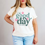 It's A Good Day To Be Happy Retro DTF Heat Transfer, woman wearing a white t-shirt with the phrase 'It's A Good Day To Be Happy' in retro style font with pink flower accents.