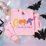 I Smell Children Silhouette DTF Heat Transfer product, pink sweatshirt with colorful silhouette designs of children and text.