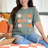 Whimsical Patterned Pumpkins DTF Heat Transfer, a graphic design featuring nine pumpkins with fall-inspired patterns in earth tones.