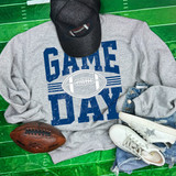Game Day Various Colors/Puff Ink Screen Print T-shirt, featuring bold blue distressed text and a football graphic, suitable for sports enthusiasts.