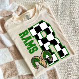 Checkered Mascot N-Z DTF Heat Transfer, a graphic design of a large number 8 with a black and white checkered pattern, green text saying 'RAMS', and a Rams mascot head with beige and green accents underneath, placed on a folded beige t-shirt.