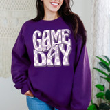 Purple Checker Game Day Coquette DTF Heat Transfer, close-up of woman wearing purple sweatshirt with game day checkerboard design and ribbon graphic.