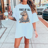 First Of All I'm A Delight DTF Heat Transfer, a white T-shirt featuring a cartoon illustration of a hippo with the words "First Of All I'm a Delight" printed on it.