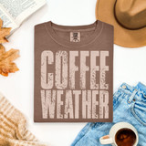 Coffee Weather DTF Heat Transfer, printed on a brown T-shirt with a distressed font design.