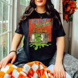 Fright Night DTF Heat Transfer, Halloween themed graphic T-shirt featuring a spooky green face and pumpkins on a vintage television