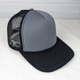 Grey Black Cow Print Foam Trucker Hat, product image featuring a stylish grey and black cow print design on a foam trucker cap with mesh sides and a curved black brim.