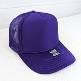 Purple Foam Trucker Hat, purple foam front and mesh back design with a curved brim and adjustable strap.