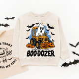 Boo-Dozer DTF Heat Transfer, a fun Halloween-themed design featuring a ghost riding a tractor surrounded by pumpkins and bats on a children's sweatshirt.