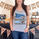 Blue Saturdays Are For Tailgates & Touchdowns DTF Heat Transfer, a woman wearing a gray tank top with a football and cups graphic for a tailgate party at a football-themed celebration.