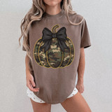 Camo Pumpkin Black Bow DTF Heat Transfer, camouflage-patterned pumpkin with a black bow on top.