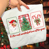 Most Wonderful Time Of The Year Trio DTF Heat Transfer, Christmas-themed fabric with Santa Claus, decorated Christmas tree, and candy canes with a festive message.