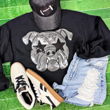 Grey Bulldog with Starry Eyes Sequins Patch, trendy casual outfit including a black sweatshirt with sequin dog design, distressed denim shorts, white Reebok sneakers, and a black cap with a football patch, laid out on a green background.