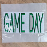 FLAWED Large Game Day PUFF Embroidered Patch - Various Colors, green embroidered patch with the words 'GAME DAY' on a white background, in packaging.