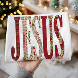 Faux Quilted Jesus DTF Heat Transfer, festive holiday shirt displaying the word 'JOY' with patchwork-style red, gold, and plaid patterns.
