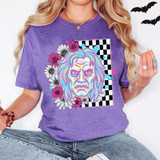 Billy Distressed Floral DTF Heat Transfer, colorful distressed zombie face with floral design on a purple T-shirt.