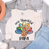 One Thankful Para DTF Heat Transfer, colorful cartoon turkey with measuring tools and the text 'one thankful PARA' on a white sweatshirt.
