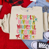 Simply Having a Wonderful Christmas Time DTF Heat Transfer, colorful Christmas-themed text and decorations on a cream-colored sweatshirt.