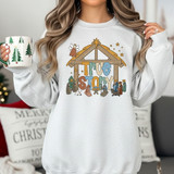 True Story Nativity DTF Heat Transfer, Christmas-themed design on a sweatshirt featuring nativity scene elements and holiday characters.