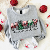 Patterned Merry Titles DTF Heat Transfer, Christmas-themed holiday design on a gray sweatshirt with festive colors and patterns.