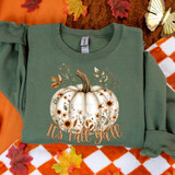 It's Fall Yall White Pumpkin DTF Heat Transfer, a green sweatshirt with a decorative white pumpkin and floral design for fall season.