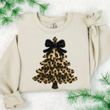 Faux Yarn Leopard Bow Tree DTF Heat Transfer, Christmas sweater featuring a leopard print Christmas tree with a black faux yarn bow on top.