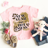 New Year Same Hot Mess YOUTH Screen Print Transfer, pink children's t-shirt with glitter and leopard print design, surrounded by gold shoes, a plush toy, jeans, and a pink bow.