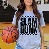 Distressed Slam Dunk BLACK DTF Heat Transfer, female basketball player holding a basketball in a gymnasium with banners in the background.