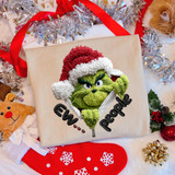 Faux Embroidery Ew, People DTF Heat Transfer Christmas-themed embroidery featuring the Grinch wearing a Santa hat, with the words 'Ew