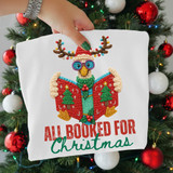 Faux Yarn All Booked For Christmas Reindeer DTF Heat Transfer, embroidered reindeer holding a Christmas book with holiday decorations and text.