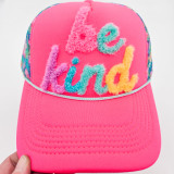 Be Kind Fluffy HAT Patch, colorful fuzzy embroidery spelling 'be kind' on a pink hat.