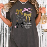 He Makes All Things New NYE Bows DTF Heat Transfer, colorful bow designs with the phrase 'He makes all things new!' printed on a woman's T-shirt.
