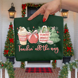 Teachin' All The Way DTF Heat Transfer, festive Christmas-themed design featuring a coffee cup, Christmas tree, gifts, and holiday messages on a dark green fabric.