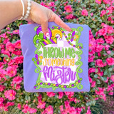 Throw Me Something Mister Mardi Gras DTF Heat Transfer, colorful Mardi Gras themed design on fabric with beads, mask, and vibrant lettering