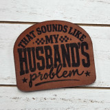 That Sounds Like My Husbands Problem Leather Hat Patch, brown leather patch with black text and decorative stars.