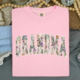 Boho Floral Names DTF Heat Transfer, pink t-shirt with floral design spelling out 'CHARLENE'.