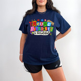 Neurodiversity Is Beautiful Retro DTF Heat Transfer, colorful and vibrant design on a navy blue t-shirt.