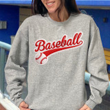 Faux Embroidery Baseball Script DTF Heat Transfer, a gray sweatshirt with a red and white baseball-themed embroidered patch reading 'Baseball' in cursive with baseball graphic details.